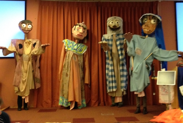 Giant Puppets tell the story of 